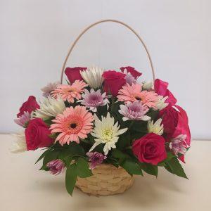 Mixed pink and white basket babsi george delivery