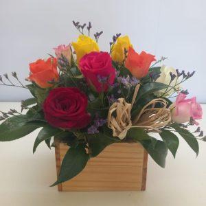 Mixed roses in a wooden box babsi george delivery