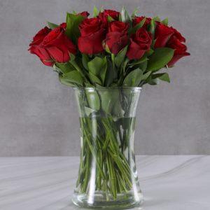 Red roses in a tall vase valentines day george delivery