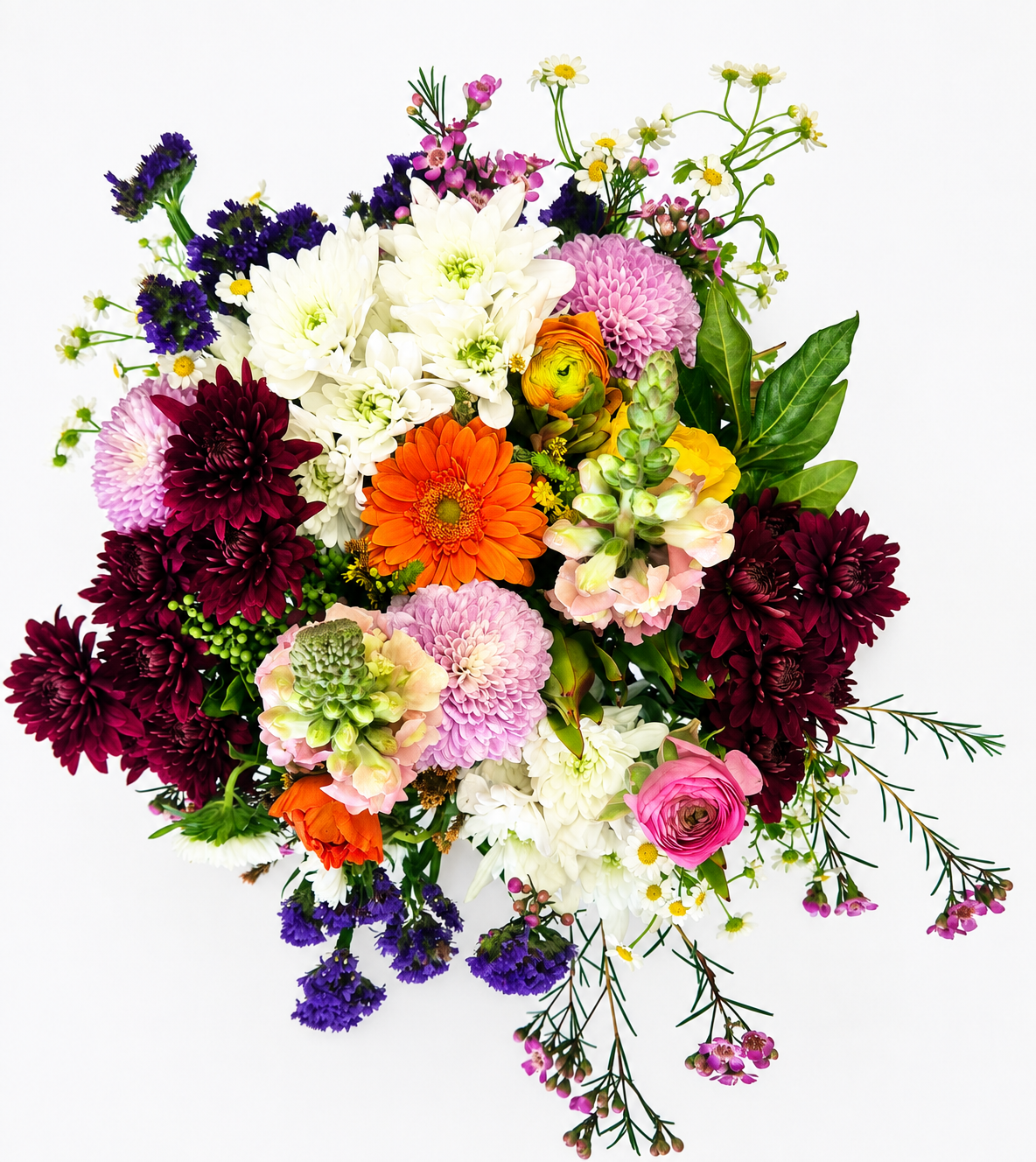 Seasonal Mix of blooms including, but not limited to ranunks, sprays, daisies, greenery, snapdragons